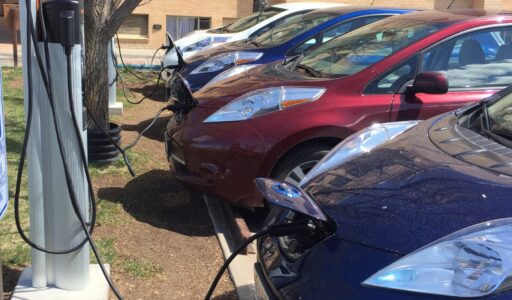 A line of charging EVs