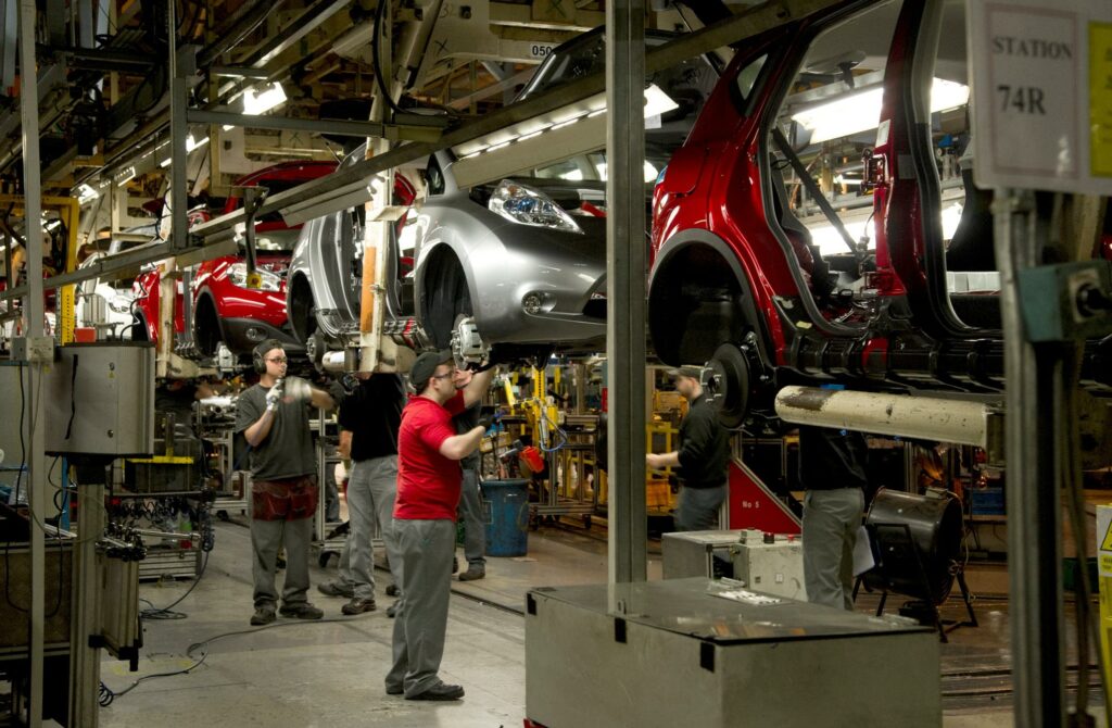 Workers in auto company.