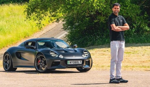 Neobolt CEO standing next to recently demonstrated EV mockup